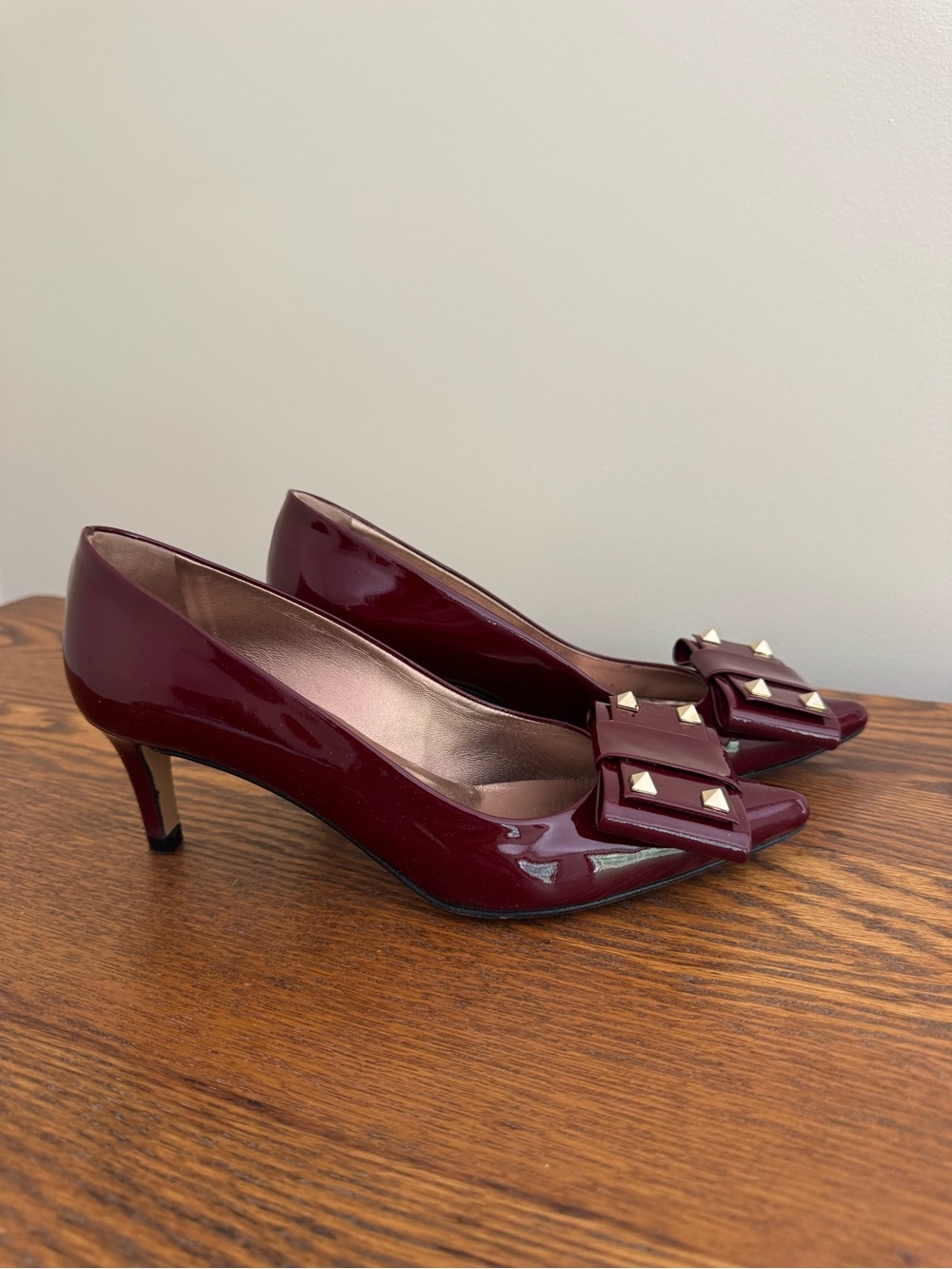 Burgundy Patent Mid-Heel Pumps with Stud Bow